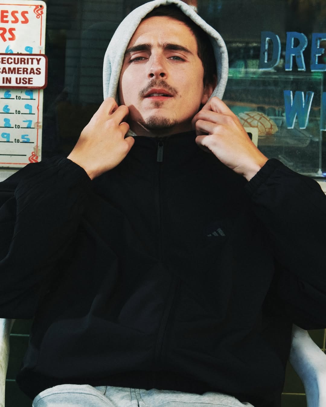 Timothée Chalamet in between takes on the set of “Backyard Legends” with adidas.#adidas #adidasf.jpg
